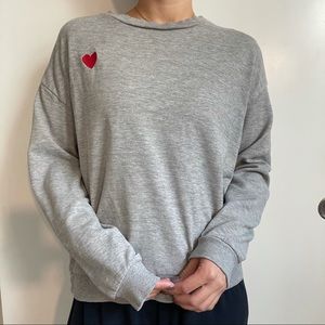 “Heart on your sleeve” sweater